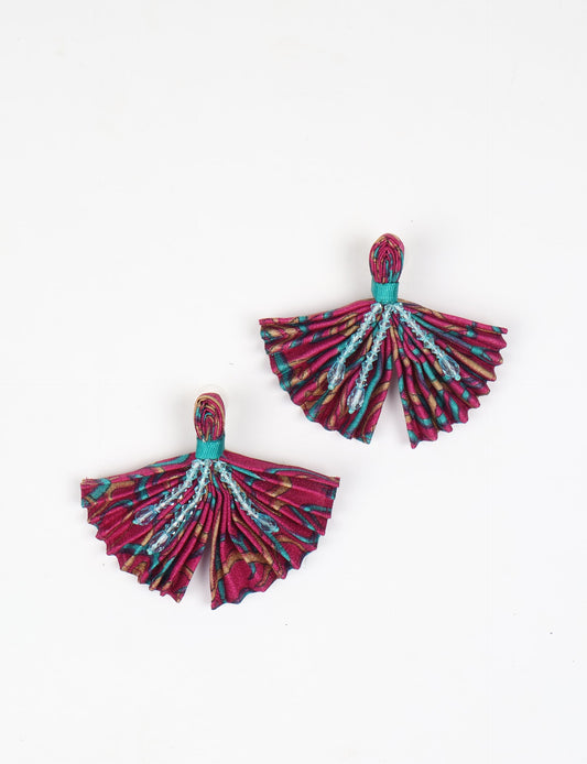 Elevate your look with our PLEATED EARRINGS – embellished with a beaded dangler, diamond-shaped metallic plate, and hook fastening. Crafted with innovative heat setting techniques on pre-loved saris, these earrings showcase ethical clothing, green fashion, and zero waste fashion. Hypoallergy tested metal hooks, nickel, and lead-free for a conscious and stylish accessory.