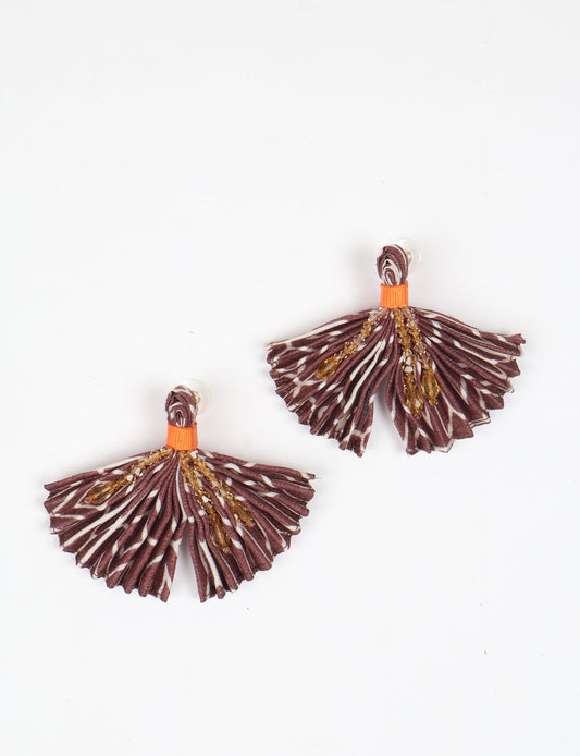 Elevate your look with our PLEATED EARRINGS – embellished with a beaded dangler, diamond-shaped metallic plate, and hook fastening. Crafted with innovative heat setting techniques on pre-loved saris, these earrings showcase ethical clothing, green fashion, and zero waste fashion. Hypoallergy tested metal hooks, nickel, and lead-free for a conscious and stylish accessory.