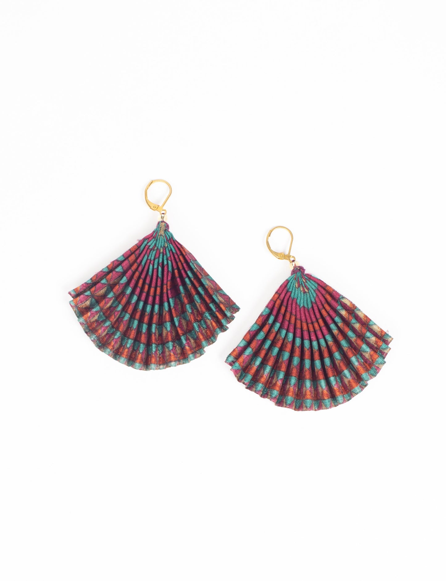 Elevate your style sustainably with our PLEATED EARRINGS – a timeless creation from pre-loved Indian saris, crafted using innovative heat setting techniques. Align with ethical clothing, green fashion, and slow fashion, these earrings are a statement of mindful elegance. Hypoallergy tested metal hooks make them a skin-friendly, sustainable choice.