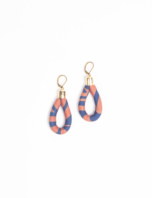 Elevate your style sustainably with our Rope Earrings. Crafted from cotton rope hand-wrapped with pre-loved saris, these earrings are a testament to ethical and green fashion. Make a conscious choice for a brighter, eco-friendly future.