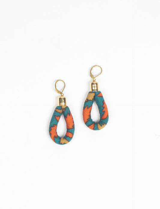 Elevate your style sustainably with our Rope Earrings. Crafted from cotton rope hand-wrapped with pre-loved saris, these earrings are a testament to ethical and green fashion. Make a conscious choice for a brighter, eco-friendly future.