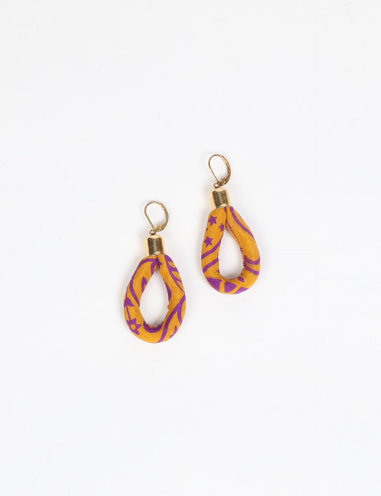 Elevate your style sustainably with our Rope Earrings. Crafted from cotton rope hand-wrapped with pre-loved saris, these earrings are a testament to ethical and green fashion. Make a conscious choice for a brighter, eco-friendly future.