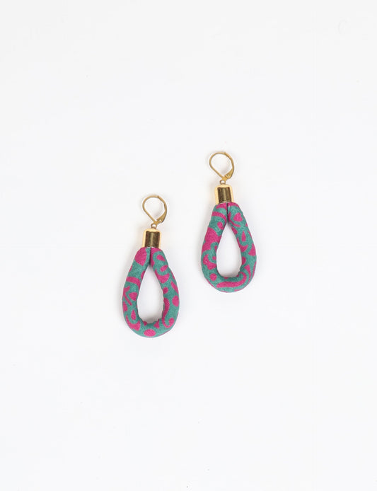 Elevate your style sustainably with our Rope Earrings. Crafted from cotton rope hand-wrapped with pre-loved saris, these earrings are a testament to ethical and green fashion. Make a conscious choice for a brighter, eco-friendly future.