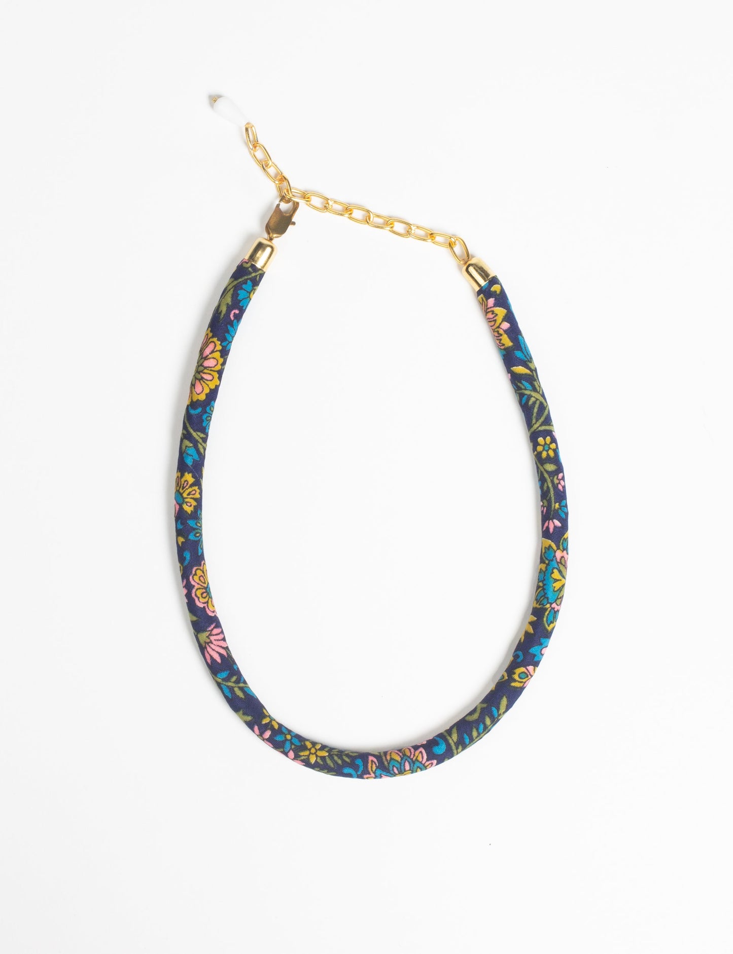 Elevate your look sustainably with our Rope Necklace. Crafted using cotton rope hand-wrapped with pre-loved Indian saris, this necklace is a testament to ethical and green fashion. Make a conscious choice for a brighter, eco-friendly future with this unique, upcycled accessory.