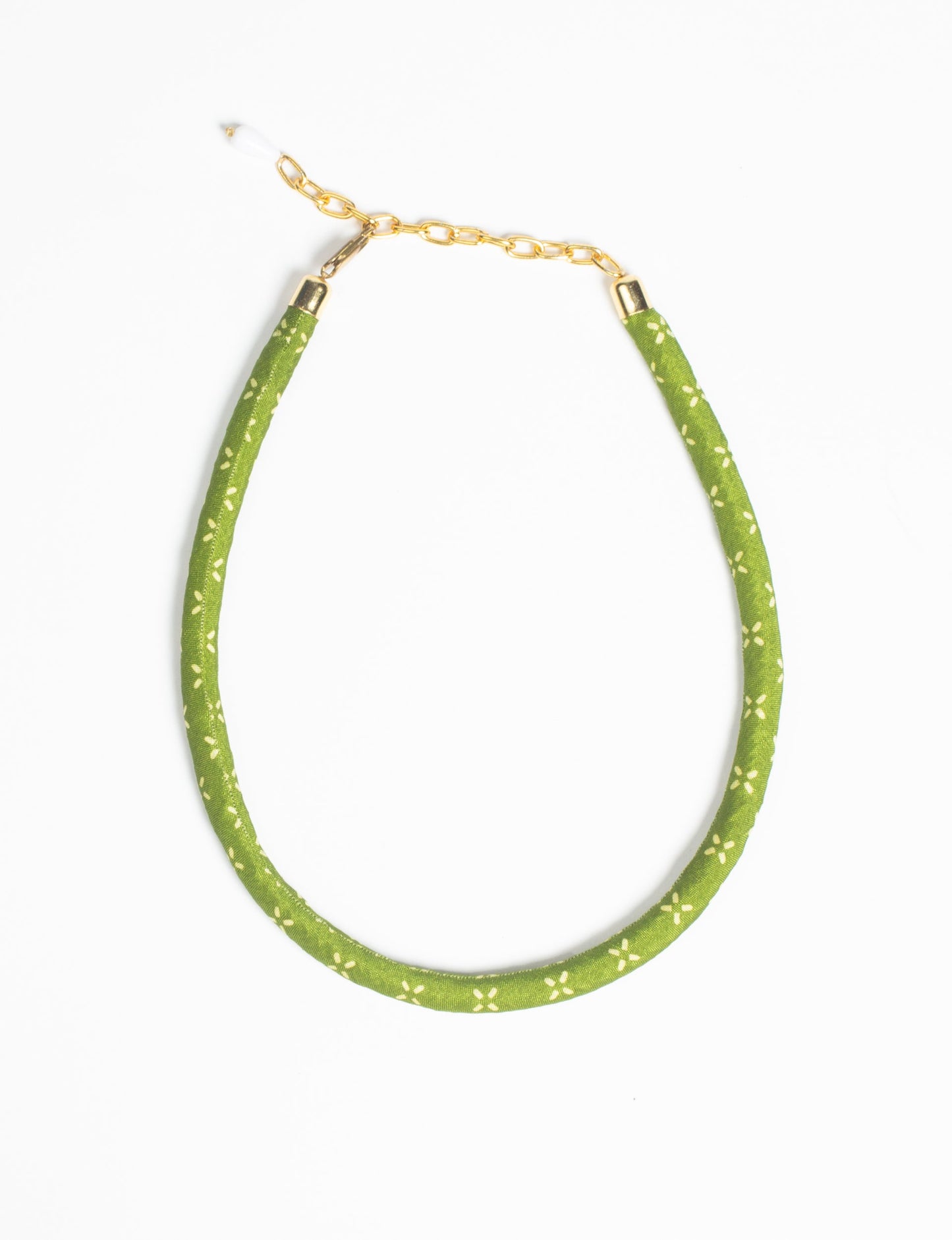 Elevate your look sustainably with our Rope Necklace. Crafted using cotton rope hand-wrapped with pre-loved Indian saris, this necklace is a testament to ethical and green fashion. Make a conscious choice for a brighter, eco-friendly future with this unique, upcycled accessory.