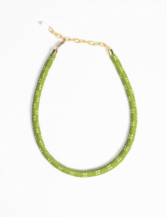 Elevate your look sustainably with our Rope Necklace. Crafted using cotton rope hand-wrapped with pre-loved Indian saris, this necklace is a testament to ethical and green fashion. Make a conscious choice for a brighter, eco-friendly future with this unique, upcycled accessory.