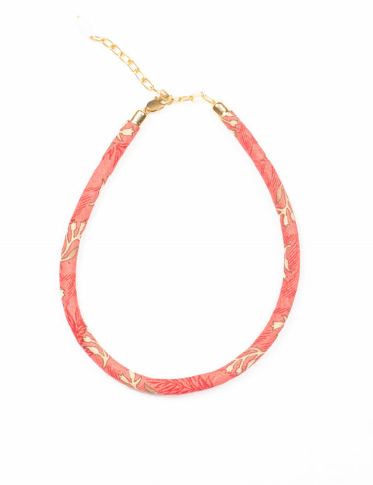 Elevate your look sustainably with our Rope Necklace. Crafted using cotton rope hand-wrapped with pre-loved Indian saris, this necklace is a testament to ethical and green fashion. Make a conscious choice for a brighter, eco-friendly future with this unique, upcycled accessory.