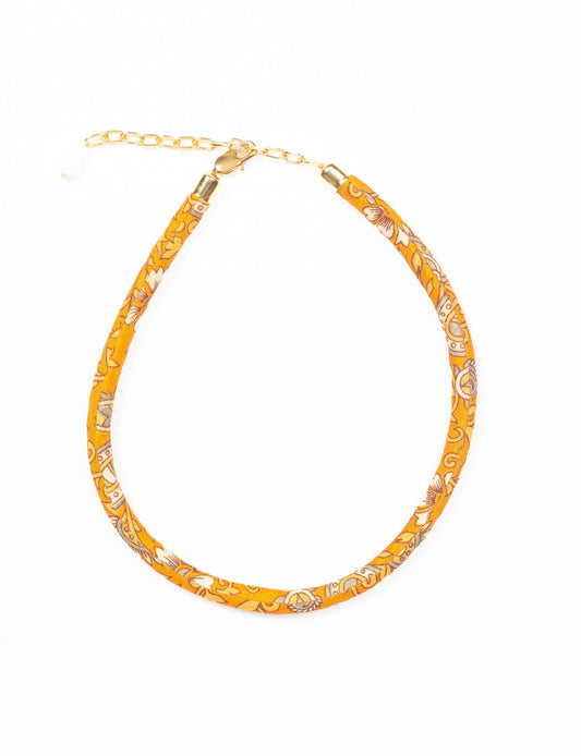 Elevate your look sustainably with our Rope Necklace. Crafted using cotton rope hand-wrapped with pre-loved Indian saris, this necklace is a testament to ethical and green fashion. Make a conscious choice for a brighter, eco-friendly future with this unique, upcycled accessory.