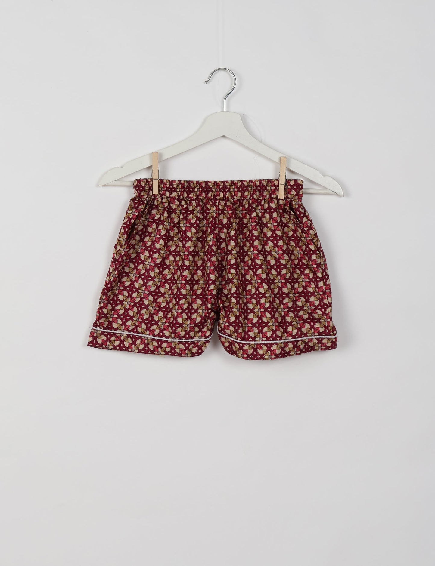 Indulge in comfort and style with our PJ Set Short, now with short sleeves. Crafted from upcycled saris, these shorts embody a zero-waste mentality for sustainable sleepwear. Versatile from day to night, perfect for beach lounging or poolside yoga, these pajamas redefine conscious fashion.