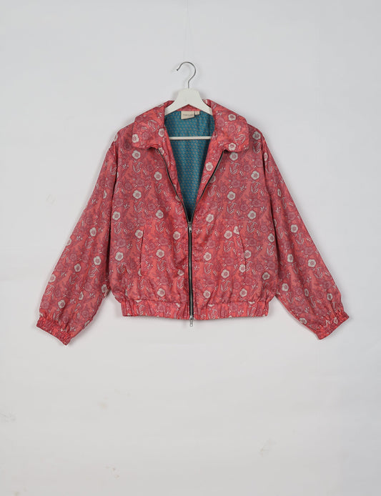 Upcycled Bomber Jacket made from recycled sari materials, featuring a cute cropped shape, elasticated hem and cuffs, and contrast sari print lining. Sustainable apparel promoting eco-friendly fashion and ethical clothing.