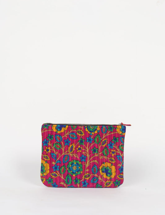 Elevate your accessory game with our QUILTED MAXI POUCH. Spacious enough for your i-pad mini, chargers, and more. Stay organized sustainably at home or on the move. Ethical fashion at its best!