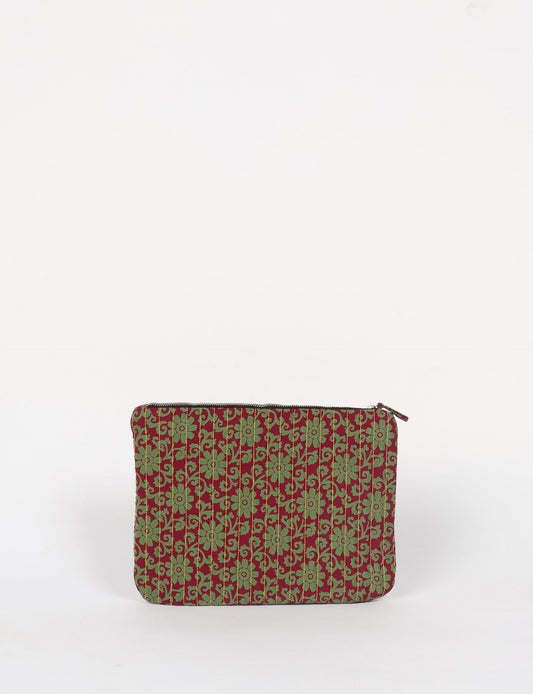 Elevate your accessory game with our QUILTED MAXI POUCH. Spacious enough for your i-pad mini, chargers, and more. Stay organized sustainably at home or on the move. Ethical fashion at its best!