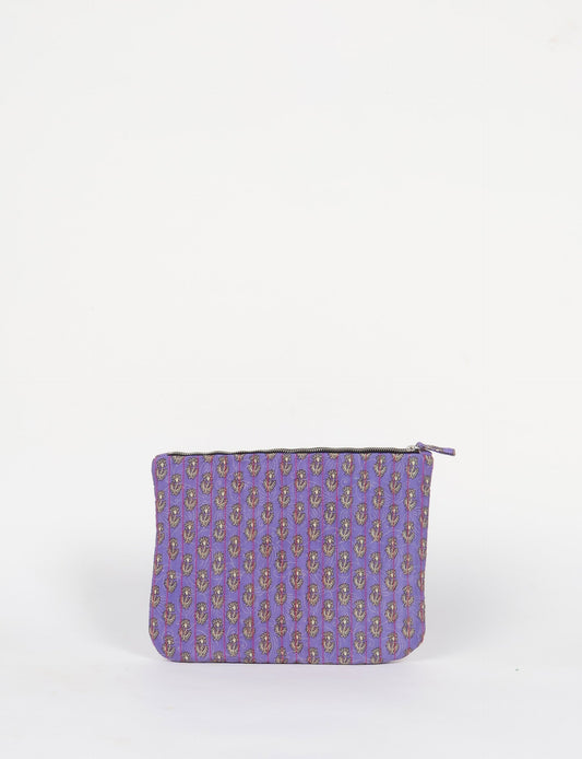 Elevate your accessory game with our QUILTED MAXI POUCH. Spacious enough for your i-pad mini, chargers, and more. Stay organized sustainably at home or on the move. Ethical fashion at its best!