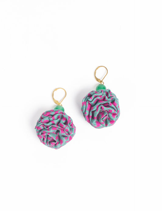 Elevate your style with our Ruffle Earrings, adorned with unique ruffle ball florets crafted from upcycled Indian saris using the traditional Aari embroidery technique. These sustainable earrings feature two glass beads and nickel-free, hypoallergenic metal hooks. Embrace ethical and green fashion with these statement pieces.