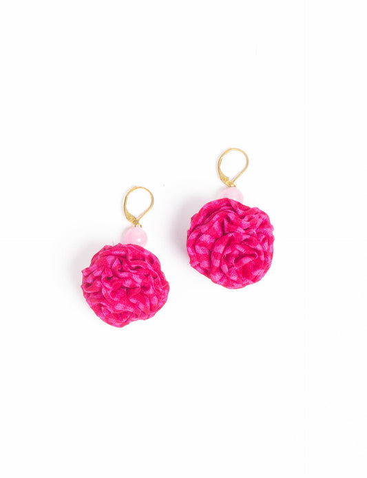 Elevate your style with our Ruffle Earrings, adorned with unique ruffle ball florets crafted from upcycled Indian saris using the traditional Aari embroidery technique. These sustainable earrings feature two glass beads and nickel-free, hypoallergenic metal hooks. Embrace ethical and green fashion with these statement pieces.