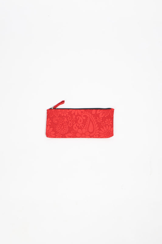 Eco-conscious quilted pencil pouch with waterproof lining made from upcycled garments, reflecting the values of circular fashion, carbon neutral fashion, and repurposed clothing. A perfect example of green fashion and sustainable women's clothing.