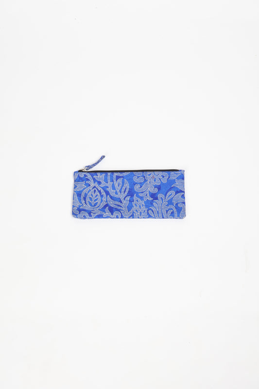 Eco-conscious quilted pencil pouch with waterproof lining made from upcycled garments, reflecting the values of circular fashion, carbon neutral fashion, and repurposed clothing. A perfect example of green fashion and sustainable women's clothing.