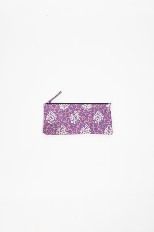 Eco-conscious quilted pencil pouch with waterproof lining made from upcycled garments, reflecting the values of circular fashion, carbon neutral fashion, and repurposed clothing. A perfect example of green fashion and sustainable women's clothing.