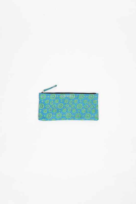 Eco-conscious quilted pencil pouch with waterproof lining made from upcycled garments, reflecting the values of circular fashion, carbon neutral fashion, and repurposed clothing. A perfect example of green fashion and sustainable women's clothing.