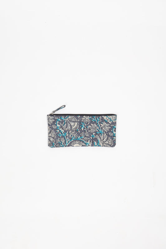Eco-conscious quilted pencil pouch with waterproof lining made from upcycled garments, reflecting the values of circular fashion, carbon neutral fashion, and repurposed clothing. A perfect example of green fashion and sustainable women's clothing.