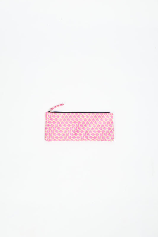 Eco-conscious quilted pencil pouch with waterproof lining made from upcycled garments, reflecting the values of circular fashion, carbon neutral fashion, and repurposed clothing. A perfect example of green fashion and sustainable women's clothing.