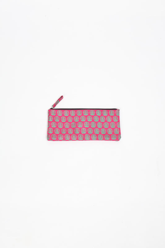 Eco-conscious quilted pencil pouch with waterproof lining made from upcycled garments, reflecting the values of circular fashion, carbon neutral fashion, and repurposed clothing. A perfect example of green fashion and sustainable women's clothing.