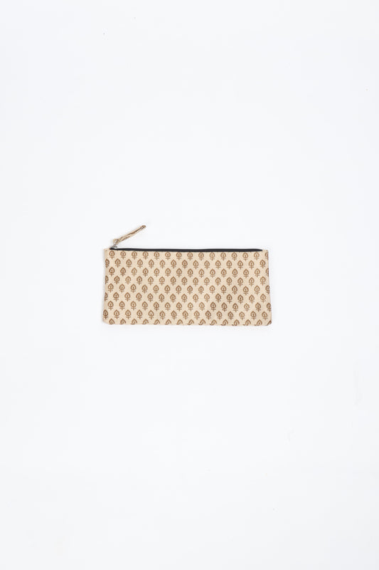 Eco-conscious quilted pencil pouch with waterproof lining made from upcycled garments, reflecting the values of circular fashion, carbon neutral fashion, and repurposed clothing. A perfect example of green fashion and sustainable women's clothing.