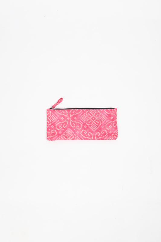 Eco-conscious quilted pencil pouch with waterproof lining made from upcycled garments, reflecting the values of circular fashion, carbon neutral fashion, and repurposed clothing. A perfect example of green fashion and sustainable women's clothing.