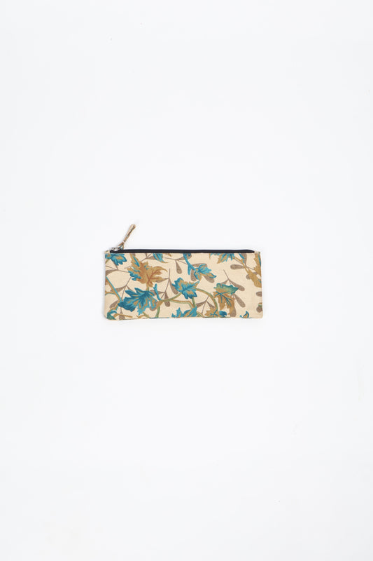Eco-conscious quilted pencil pouch with waterproof lining made from upcycled garments, reflecting the values of circular fashion, carbon neutral fashion, and repurposed clothing. A perfect example of green fashion and sustainable women's clothing.