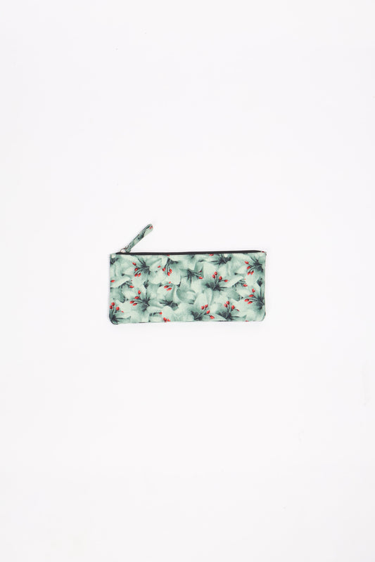 Eco-conscious quilted pencil pouch with waterproof lining made from upcycled garments, reflecting the values of circular fashion, carbon neutral fashion, and repurposed clothing. A perfect example of green fashion and sustainable women's clothing.