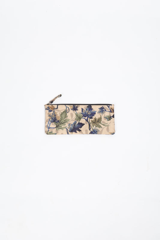 Eco-conscious quilted pencil pouch with waterproof lining made from upcycled garments, reflecting the values of circular fashion, carbon neutral fashion, and repurposed clothing. A perfect example of green fashion and sustainable women's clothing.