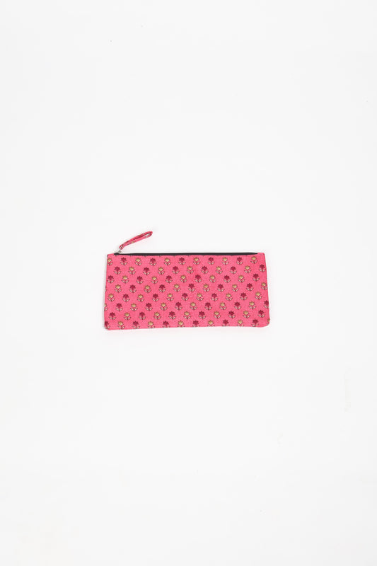 Eco-conscious quilted pencil pouch with waterproof lining made from upcycled garments, reflecting the values of circular fashion, carbon neutral fashion, and repurposed clothing. A perfect example of green fashion and sustainable women's clothing.