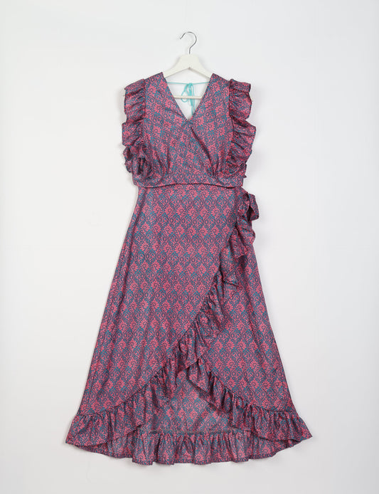 Frill Skirt Set made from recycled materials, highlighting sustainable fashion and fair trade practices. Features a ruffled wraparound skirt and a string-back top, symbolizing upcycled women's clothing and eco-friendly fashion.