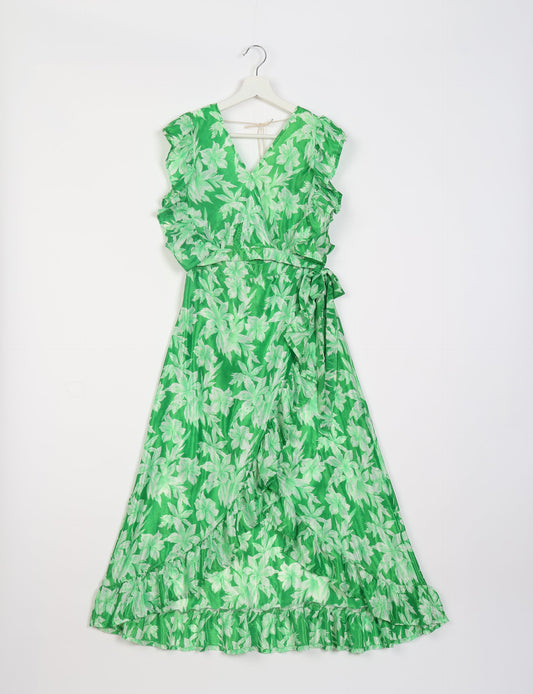 Frill Skirt Set made from recycled materials, highlighting sustainable fashion and fair trade practices. Features a ruffled wraparound skirt and a string-back top, symbolizing upcycled women's clothing and eco-friendly fashion.