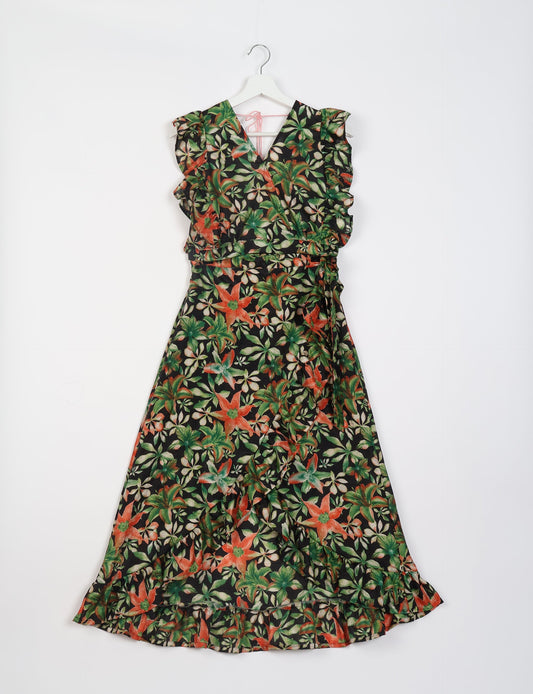 Frill Skirt Set made from recycled materials, highlighting sustainable fashion and fair trade practices. Features a ruffled wraparound skirt and a string-back top, symbolizing upcycled women's clothing and eco-friendly fashion.