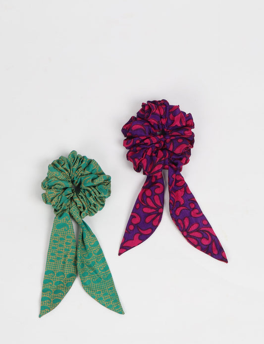 Colorful Tail Scrunchy made from sustainable, upcycled women's clothing. An eco-friendly fashion accessory promoting green fashion, recycled clothing, and ethical fashion choices.