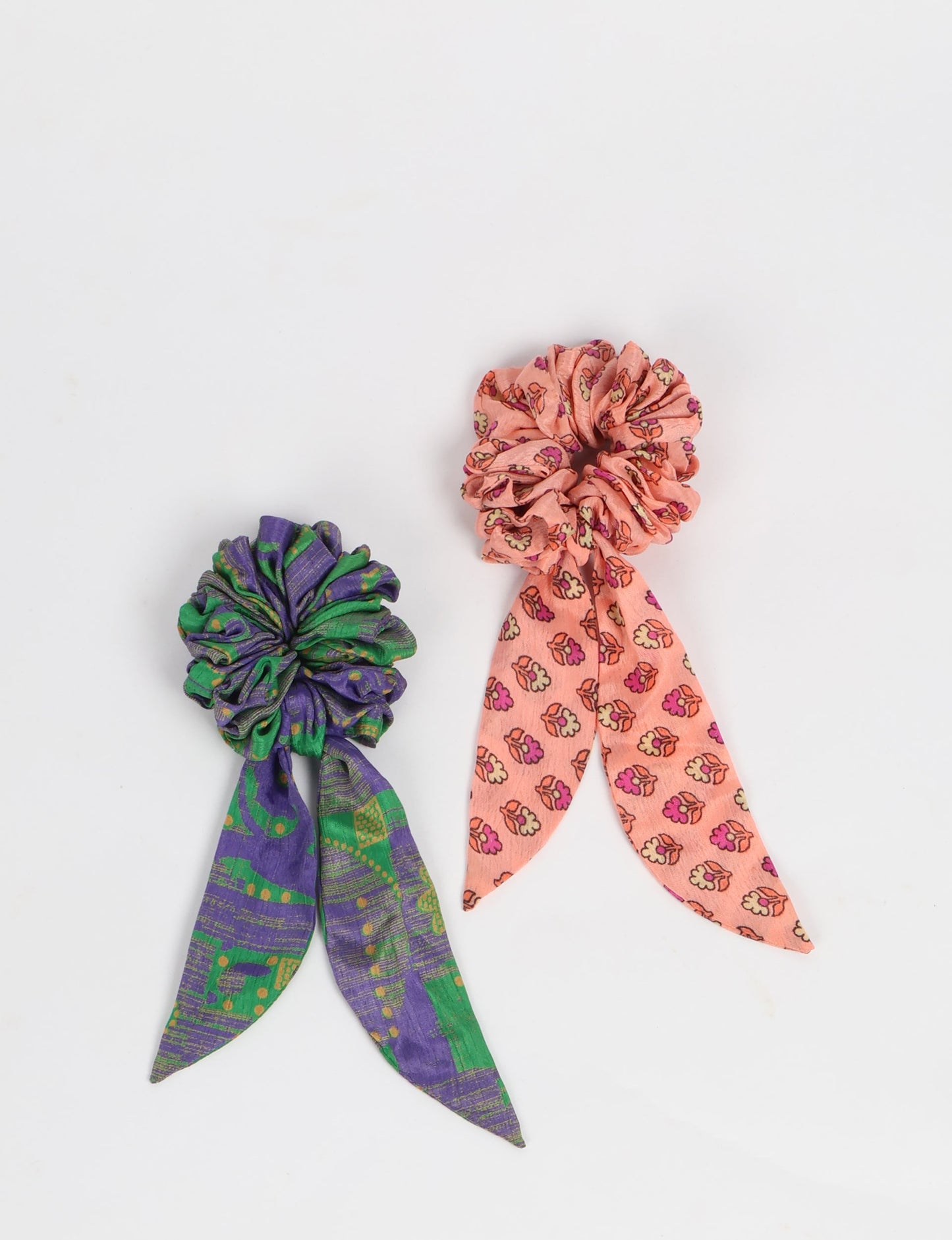 Colorful Tail Scrunchy made from sustainable, upcycled women's clothing. An eco-friendly fashion accessory promoting green fashion, recycled clothing, and ethical fashion choices.