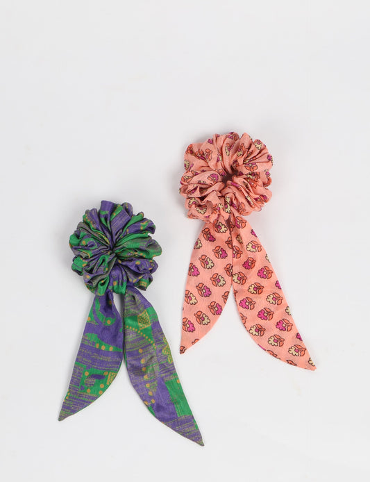 Colorful Tail Scrunchy made from sustainable, upcycled women's clothing. An eco-friendly fashion accessory promoting green fashion, recycled clothing, and ethical fashion choices.