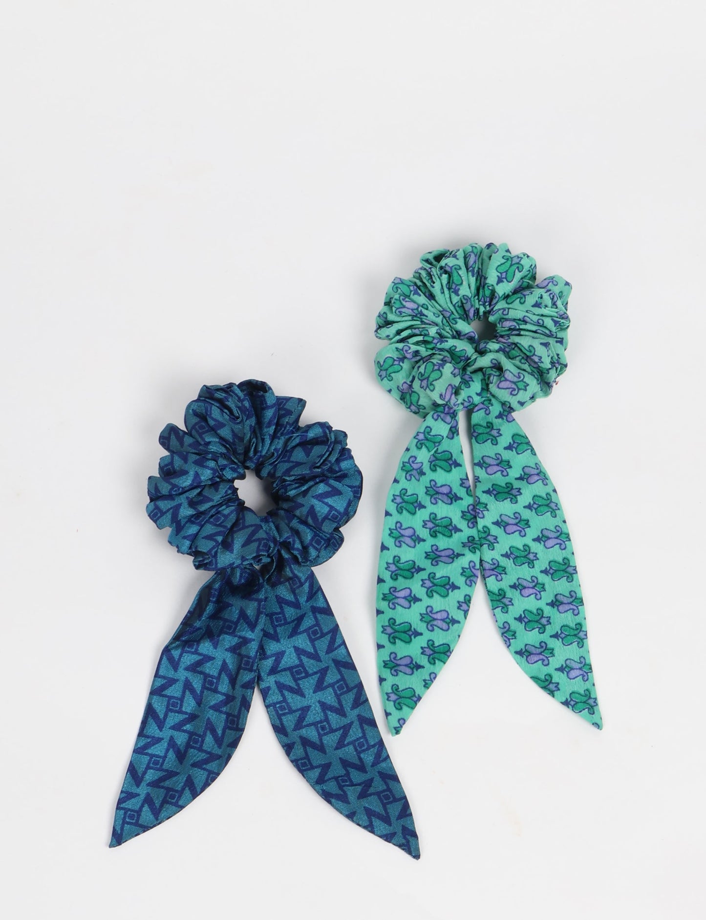 Colorful Tail Scrunchy made from sustainable, upcycled women's clothing. An eco-friendly fashion accessory promoting green fashion, recycled clothing, and ethical fashion choices.