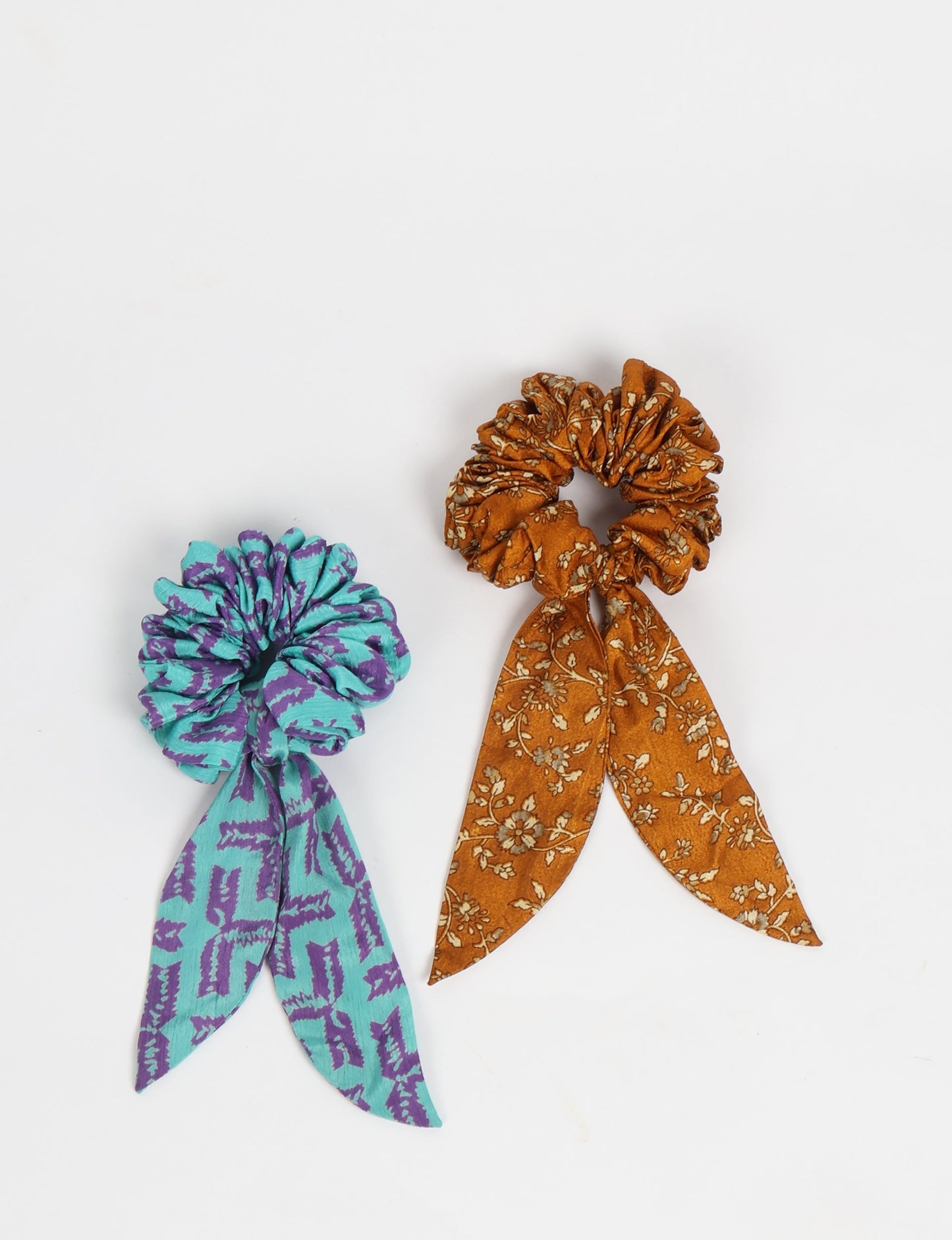 Colorful Tail Scrunchy made from sustainable, upcycled women's clothing. An eco-friendly fashion accessory promoting green fashion, recycled clothing, and ethical fashion choices.