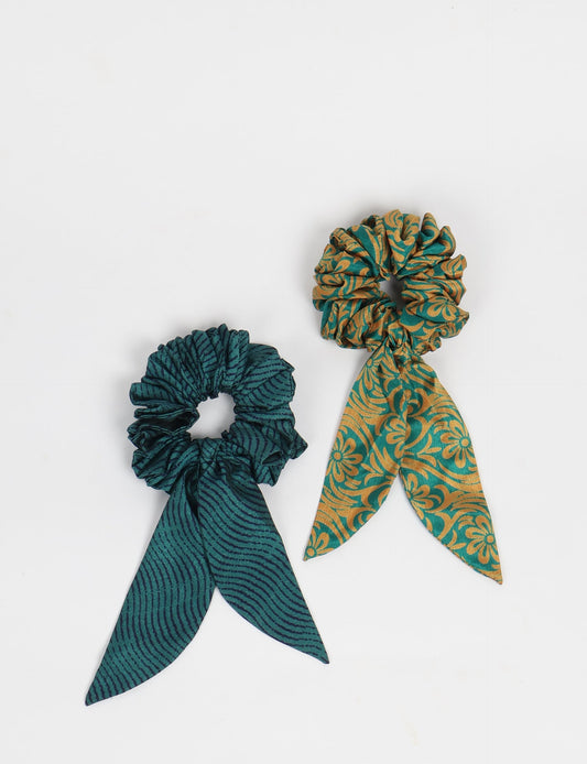 Colorful Tail Scrunchy made from sustainable, upcycled women's clothing. An eco-friendly fashion accessory promoting green fashion, recycled clothing, and ethical fashion choices.