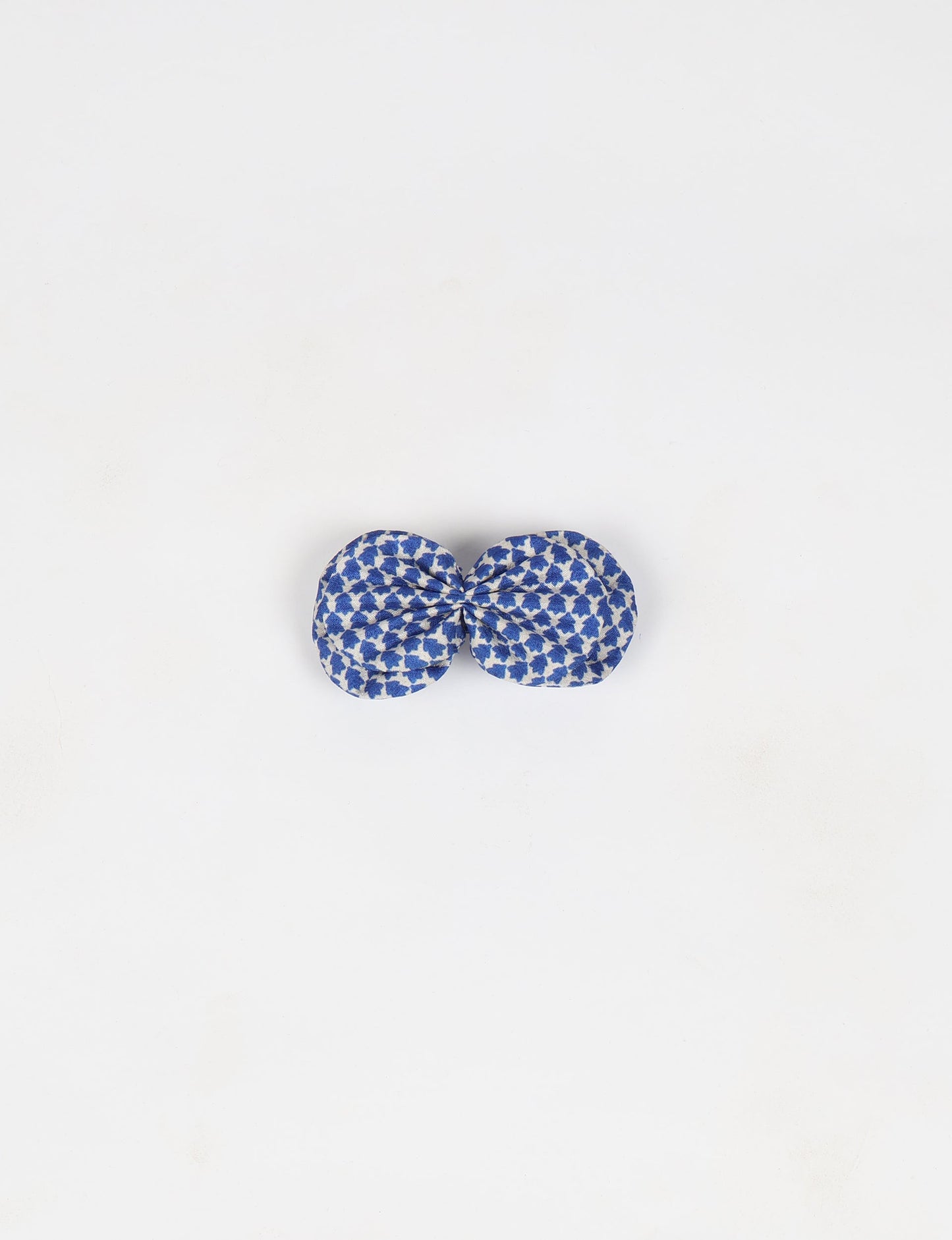 Stylish upcycled women's hairclip made from eco friendly products, reflecting the essence of upcycling fashion, ethical clothing, and sustainable apparel—ideal for those embracing slow fashion and earth friendly clothing.