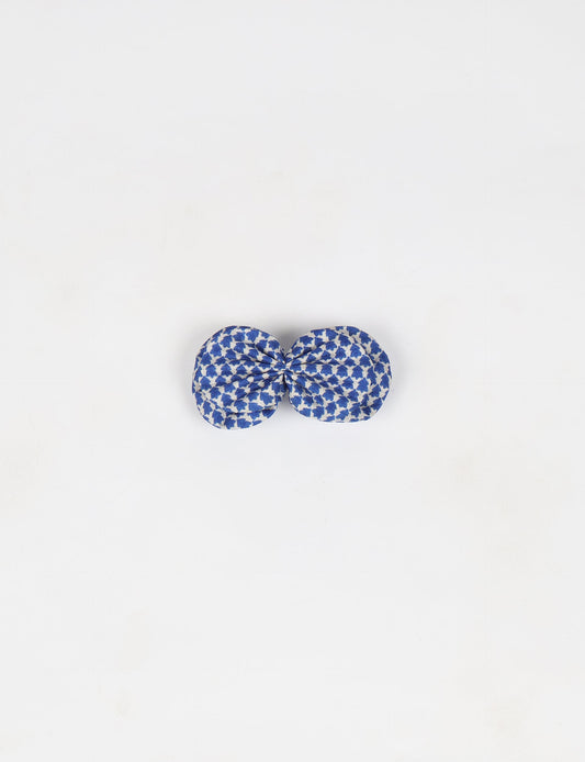 Stylish upcycled women's hairclip made from eco friendly products, reflecting the essence of upcycling fashion, ethical clothing, and sustainable apparel—ideal for those embracing slow fashion and earth friendly clothing.