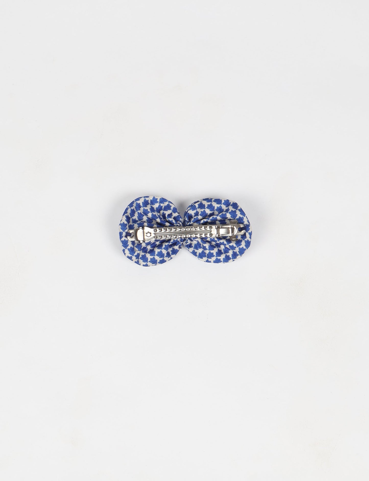 Stylish upcycled women's hairclip made from eco friendly products, reflecting the essence of upcycling fashion, ethical clothing, and sustainable apparel—ideal for those embracing slow fashion and earth friendly clothing.