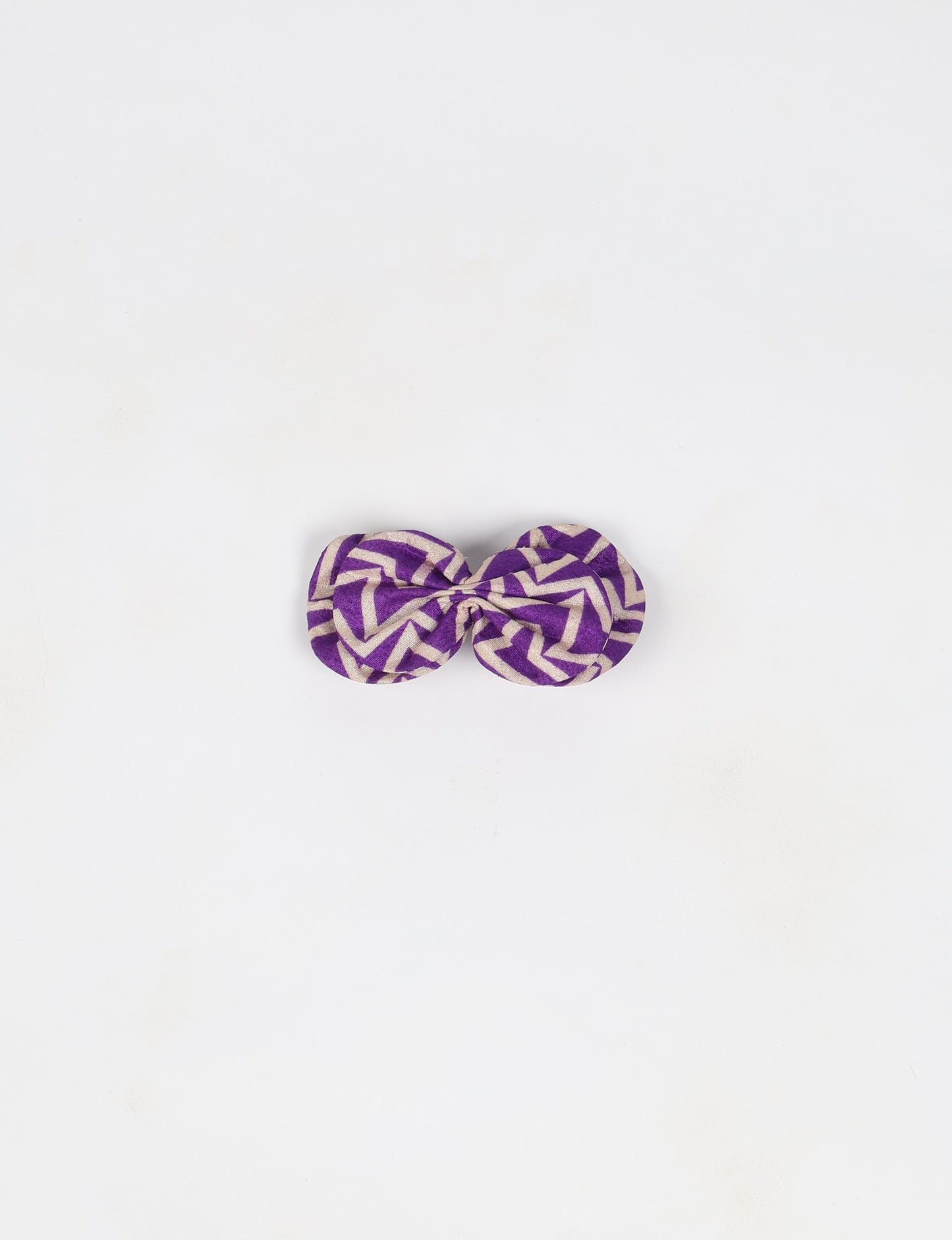 Stylish upcycled women's hairclip made from eco friendly products, reflecting the essence of upcycling fashion, ethical clothing, and sustainable apparel—ideal for those embracing slow fashion and earth friendly clothing.