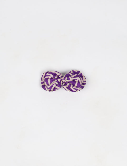 Stylish upcycled women's hairclip made from eco friendly products, reflecting the essence of upcycling fashion, ethical clothing, and sustainable apparel—ideal for those embracing slow fashion and earth friendly clothing.