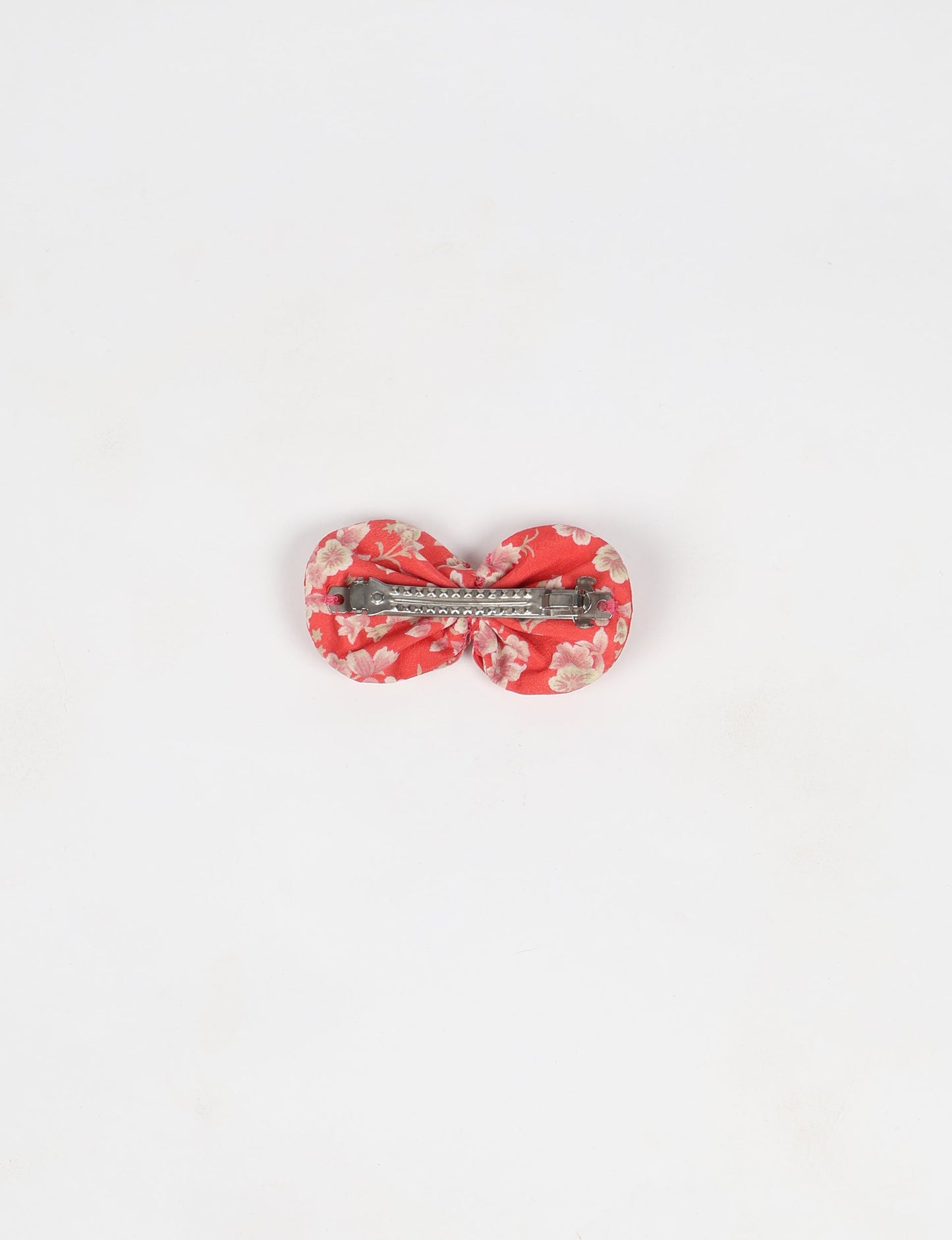 Stylish upcycled women's hairclip made from eco friendly products, reflecting the essence of upcycling fashion, ethical clothing, and sustainable apparel—ideal for those embracing slow fashion and earth friendly clothing.