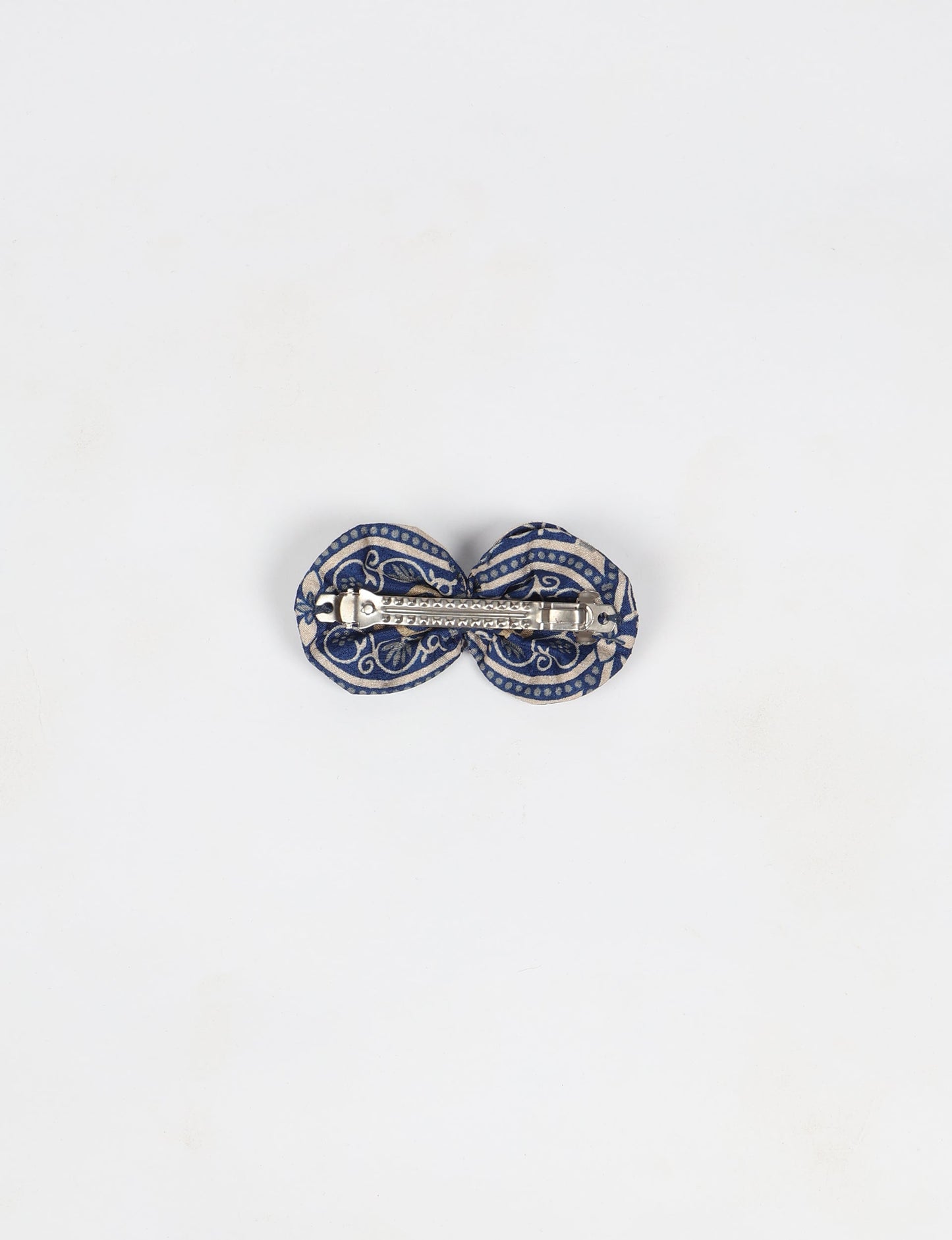 Stylish upcycled women's hairclip made from eco friendly products, reflecting the essence of upcycling fashion, ethical clothing, and sustainable apparel—ideal for those embracing slow fashion and earth friendly clothing.