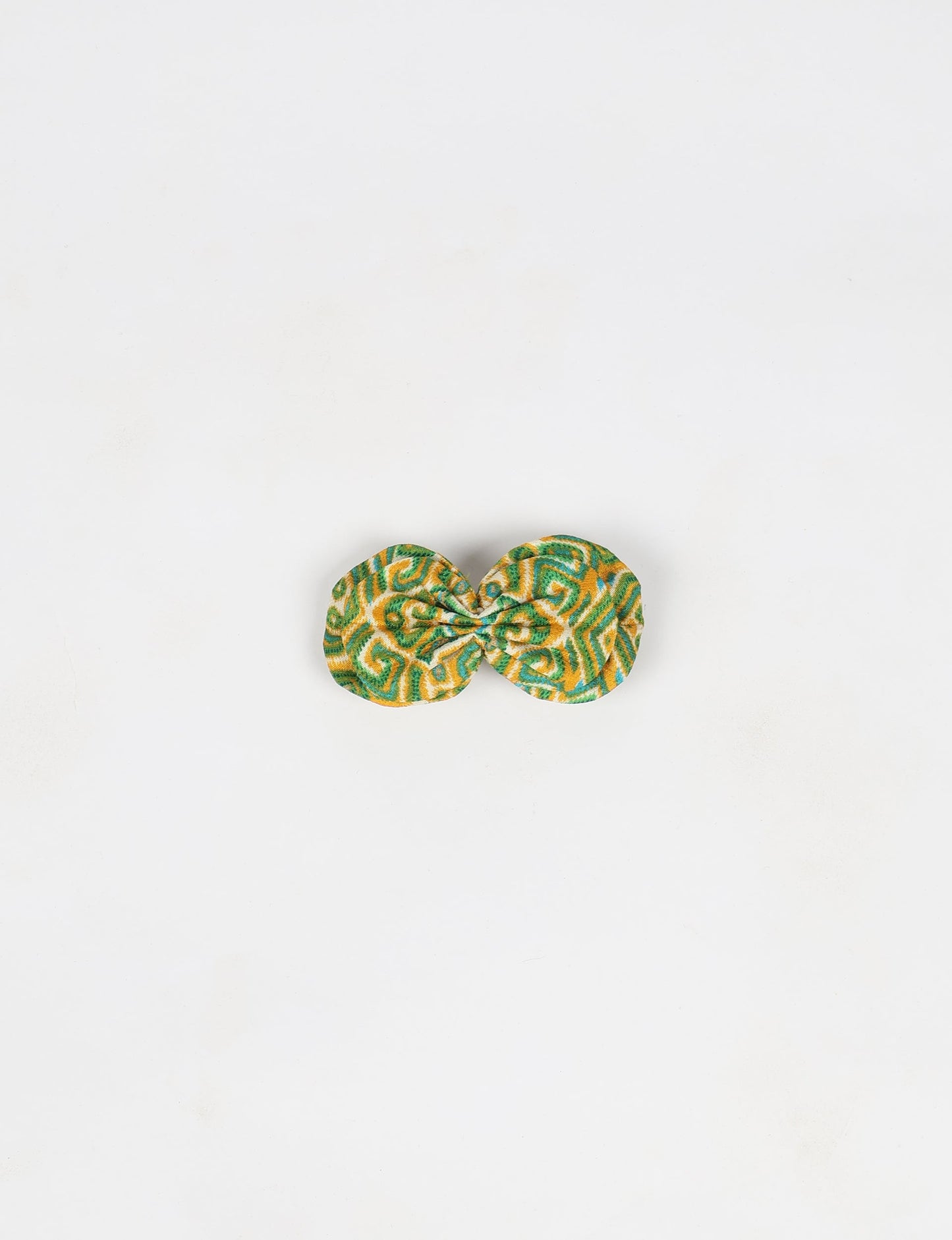 Stylish upcycled women's hairclip made from eco friendly products, reflecting the essence of upcycling fashion, ethical clothing, and sustainable apparel—ideal for those embracing slow fashion and earth friendly clothing.