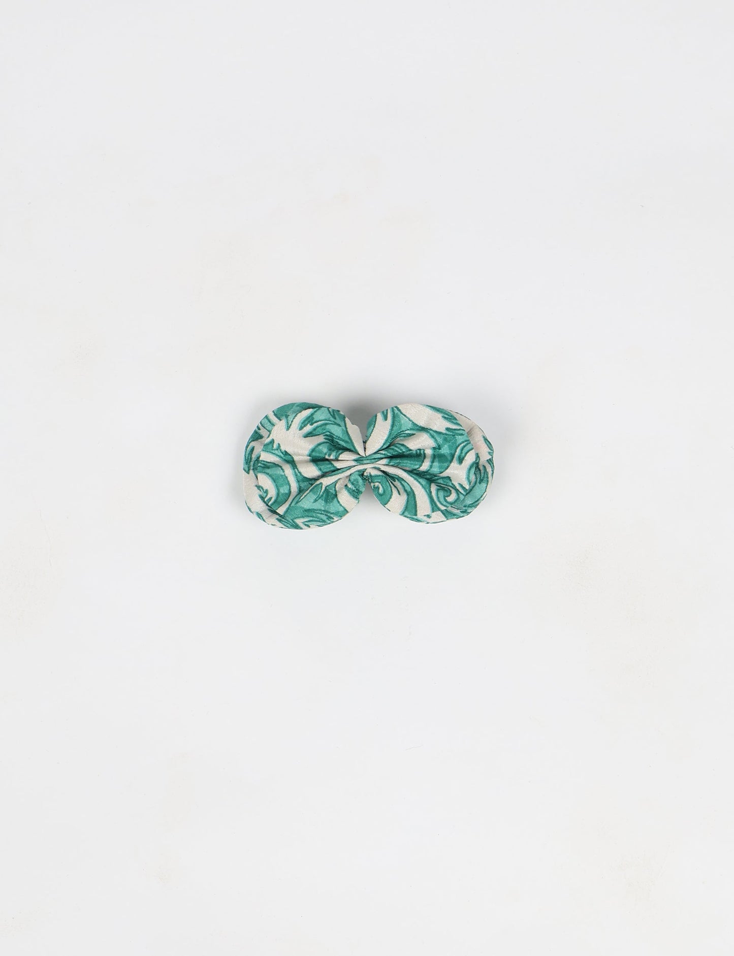 Stylish upcycled women's hairclip made from eco friendly products, reflecting the essence of upcycling fashion, ethical clothing, and sustainable apparel—ideal for those embracing slow fashion and earth friendly clothing.